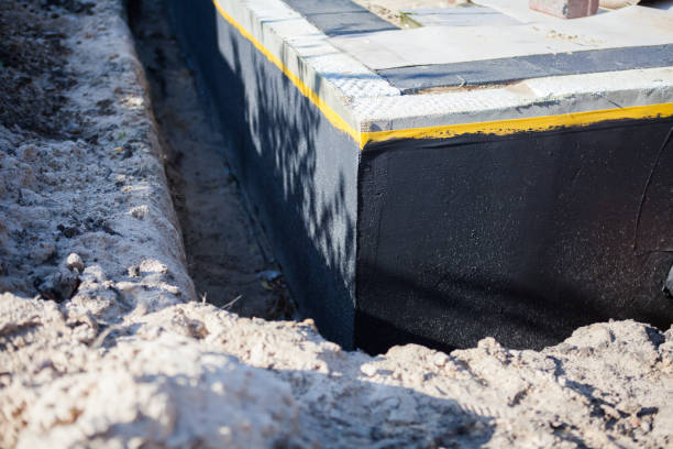 Professional Waterproofing technician working in Chilton, WI